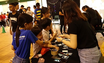 Participants getting hand painting
